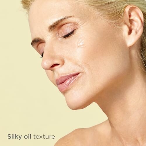 Woman with silky oil texture on face